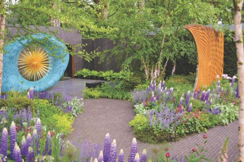 Flowers and decorative garden elements on display at the Chelease Flower Show