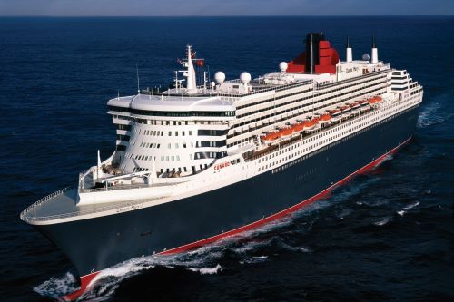 Aerial view of the Queen Mary 2 vessel in the middle of the ocean