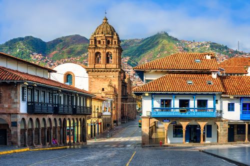 The Old town of Cusco with cobblestone streets and colonial buildings with red-tiled roofs