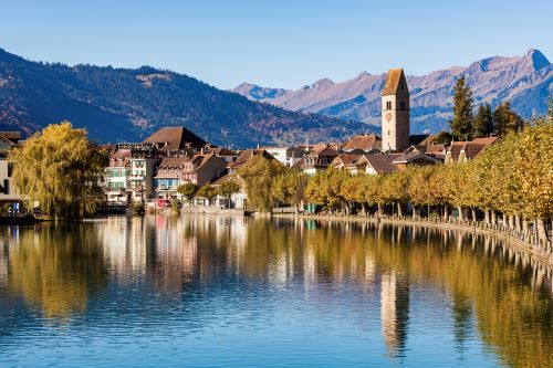 Old town of Bern by the river reflecting in the water