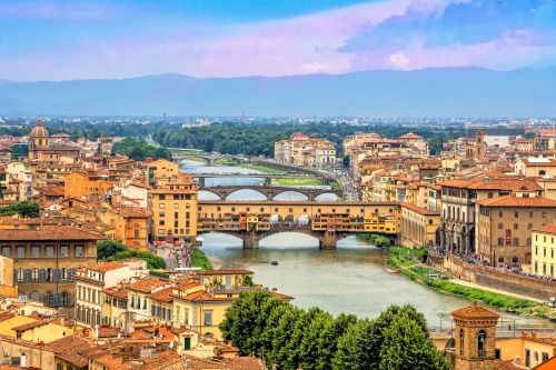 A view of Ponte Vecchio and the river in Tuscany Italy