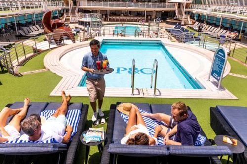Passengers enjoying the pool deck