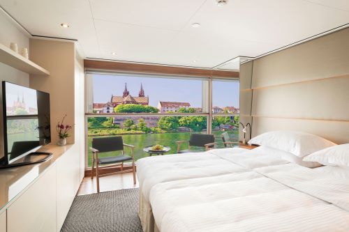 The Panorama Balcony Suite interior aboard the Emerald river vessel