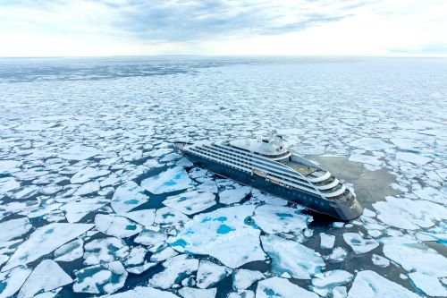 Aerial view of the Scenic vessel making its way through icy waters