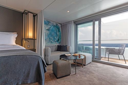Modern interior of the Balcony Suite aboard Scenic 