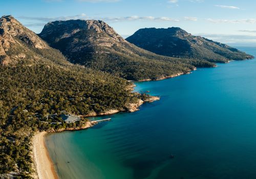 Freycinet Lodge located next to the beach and surrounded by bush and mountains