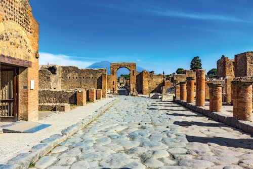 Cobblestone street between the ruins of Pompei 