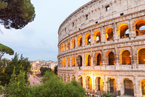 The Colosseum in Rome lit up for the evening 