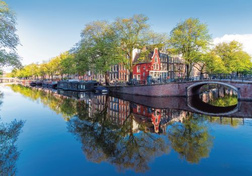 The canals of Amsterdam on a beautiful, sunny Summer morning 