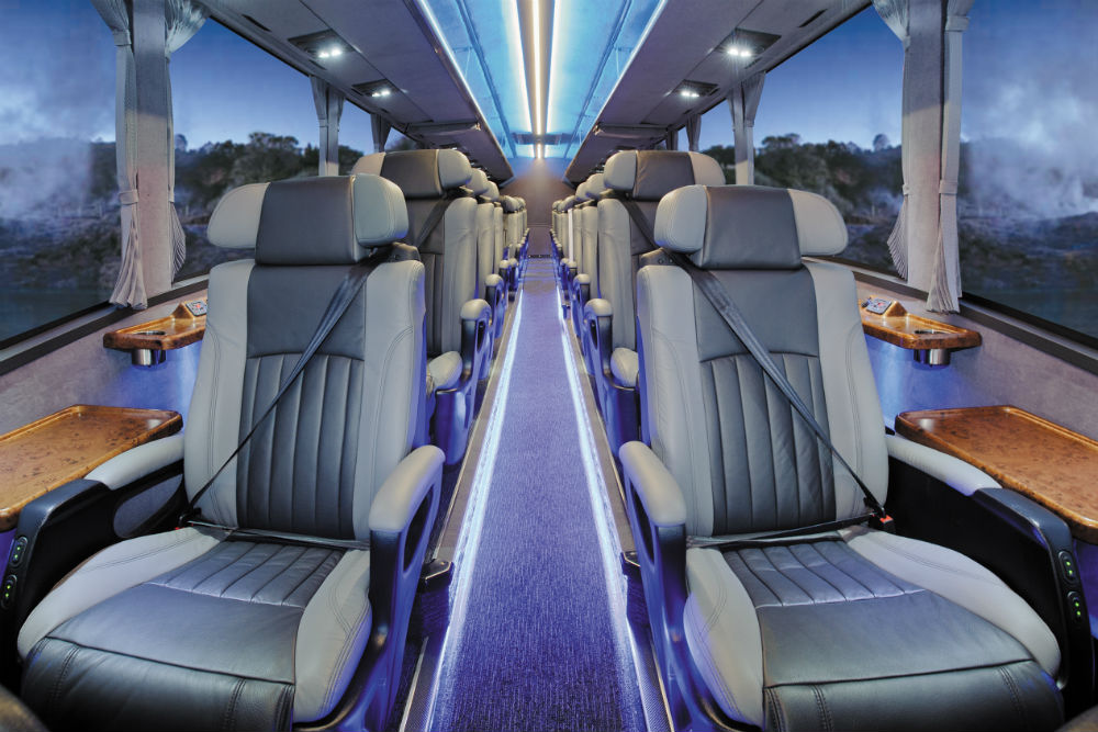 Interior of the Ultimate Coach with comfortable window single seats 