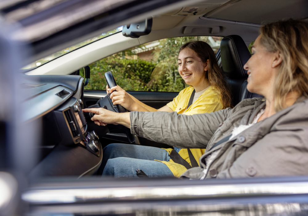 Learner driver and supervisor in the car talking