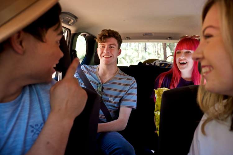 Teens in car together